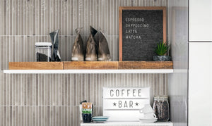 Cozy Ash 5x10 Polished Porcelain – gray glossy tile on a kitchen coffee bar wall